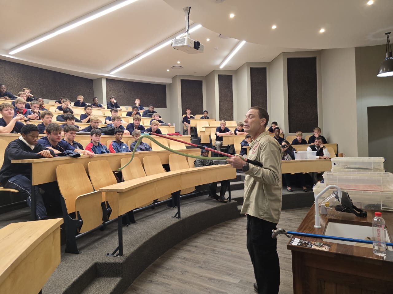 Donald presenting to students at a university lecture hall